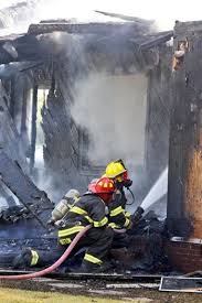 Barge carrying scrap metal, recyclables and junk cars catches fire