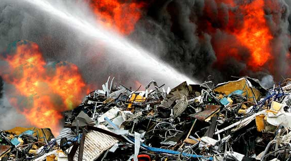 Fire in Modesto recycling center under control